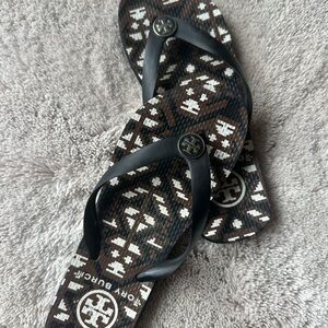 Tory Burch Brown & White Logo Pattern Flip Flops with Black Straps